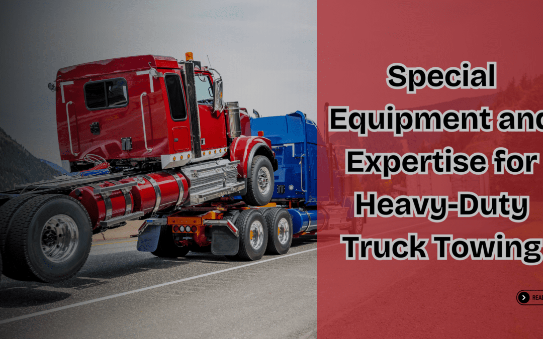 A heavy-duty tow truck transports a semi-truck on the highway with the title of the blog on the side.